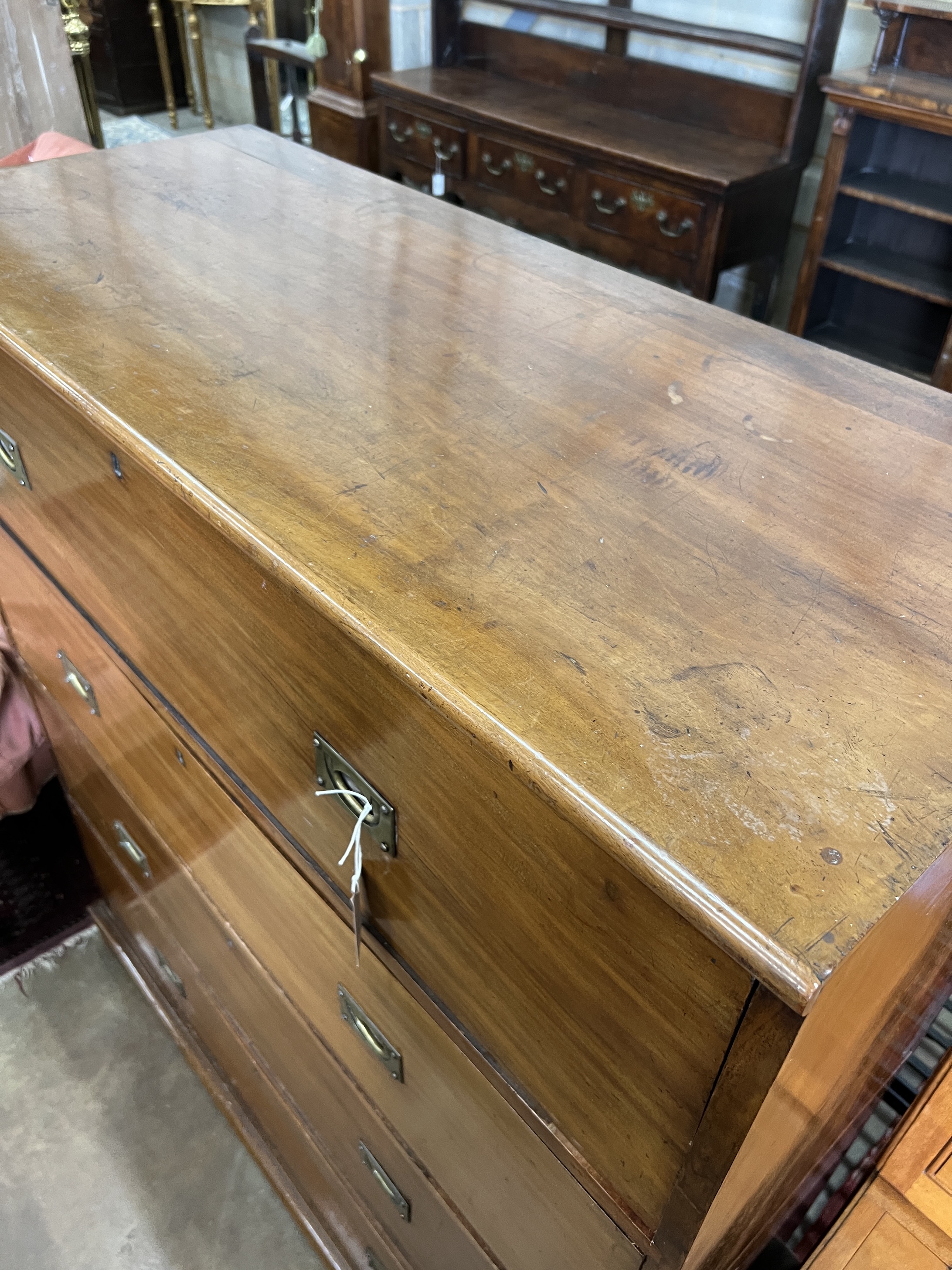 A late Victorian mahogany military style four drawer two part chest, width 115cm, depth 49cm, height 135cm